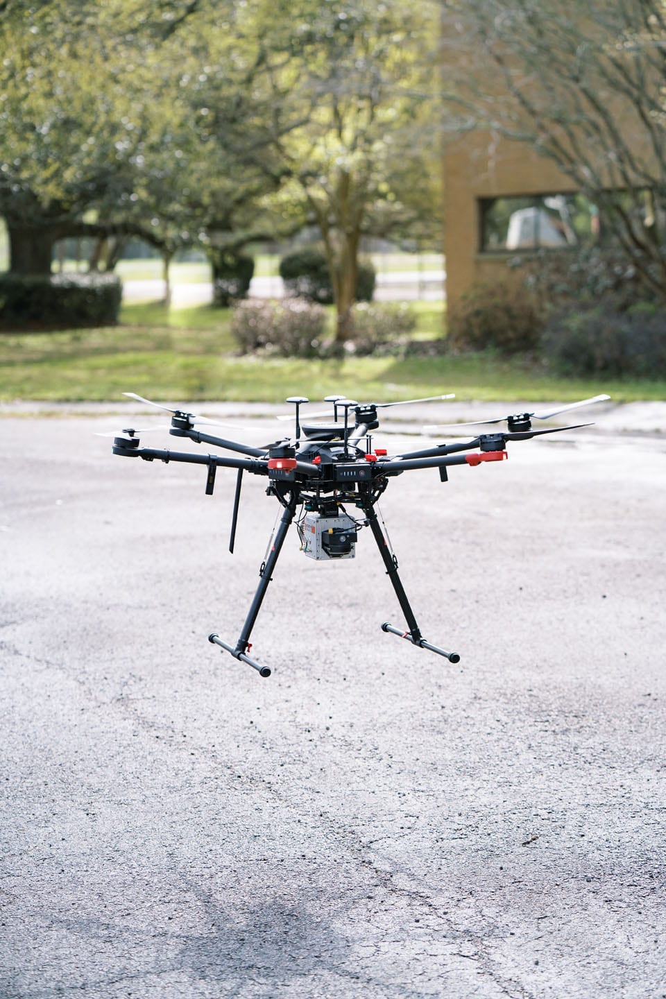 drone hovering above the ground